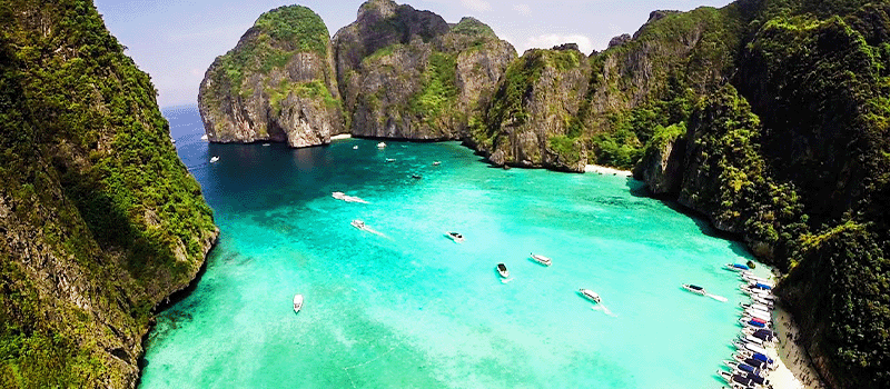 Limestone karst cliffs rising over Railay Beach in Krabi